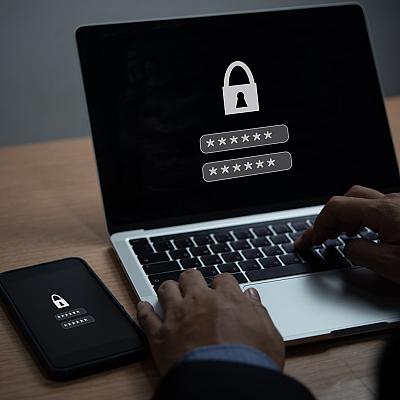 laptop and mobile phone with encryption key lock 2025 03 07 19 05 10 utc